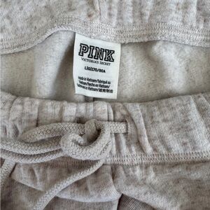 New without tags. VS Pink sweatpants. Wide leg. Size L.